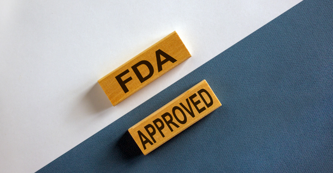 Featured image that shows two wooden bricks on a black-white background with copy on them: "FDA APPROVED"